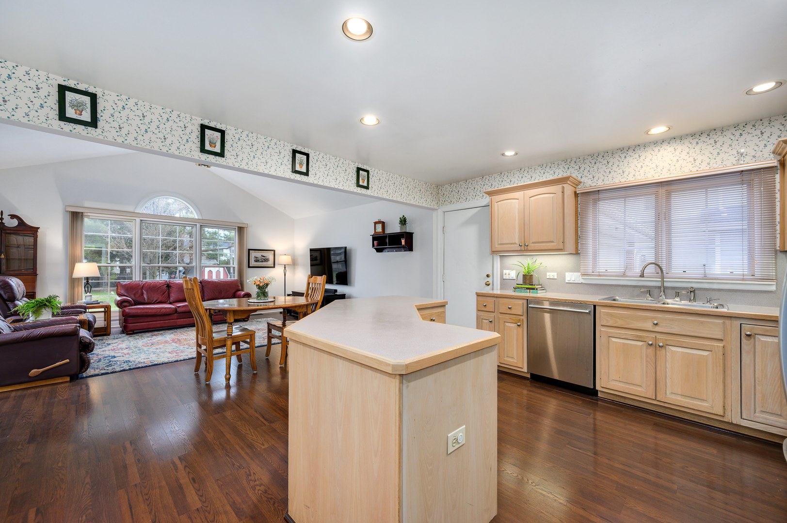 1924 Linneman Street Glenview, IL 60025 - Photo 7 of 24 a kitchen with a sink a counter top space and appliances