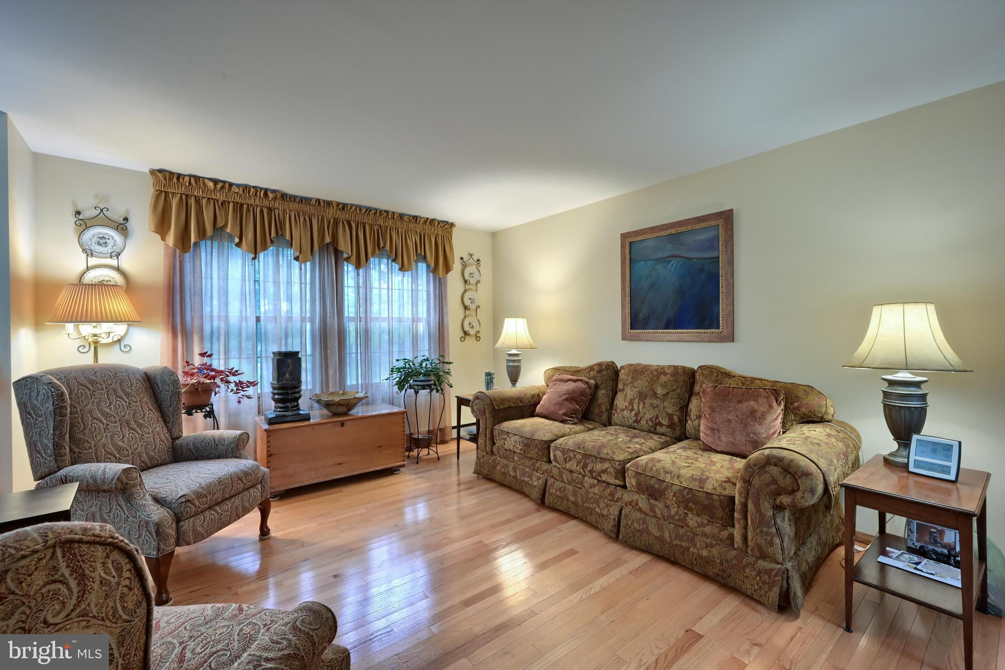 124 Petersburg Road Lancaster, PA 17601 - Photo 4 of 26 a living room with furniture and a window