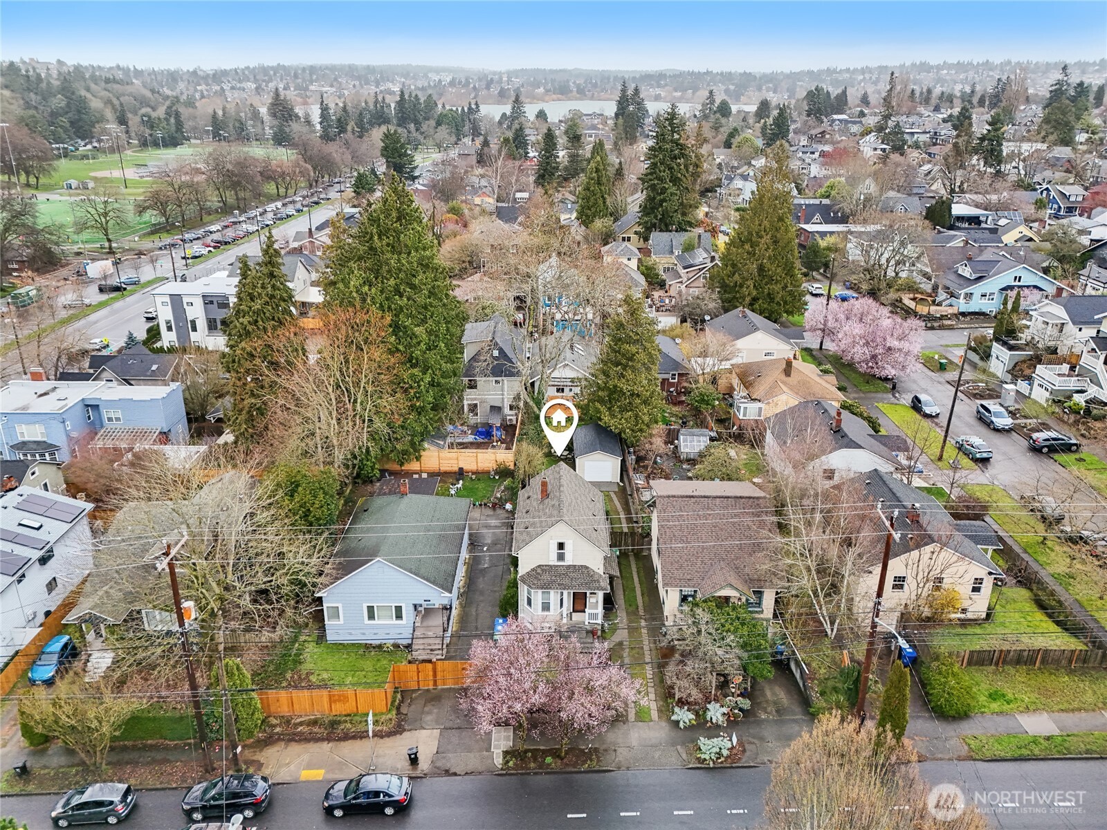 an aerial view of residential houses with outdoor space