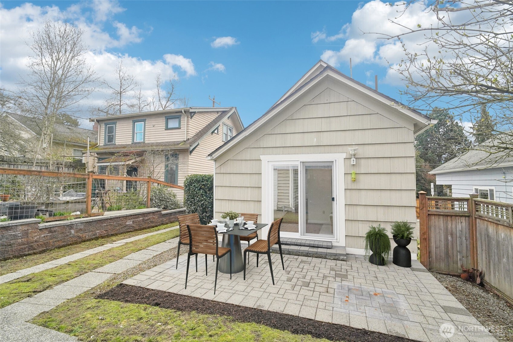 1420 North 50th Street Seattle, WA 98103 - Photo 23 of 30 a view of a house with backyard and sitting area