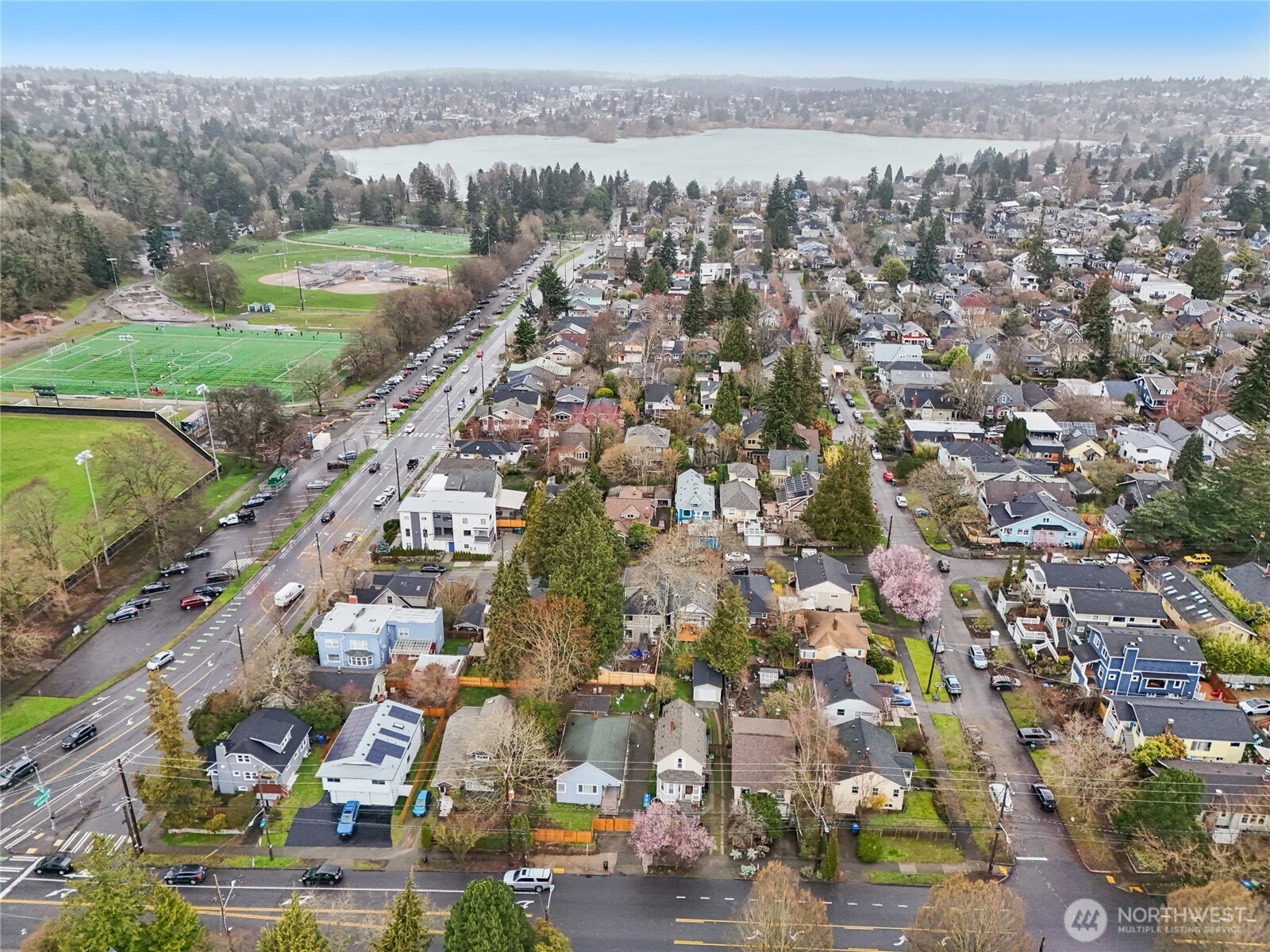 1420 North 50th Street Seattle, WA 98103 - Photo 27 of 30 an aerial view of residential houses with outdoor space and trees