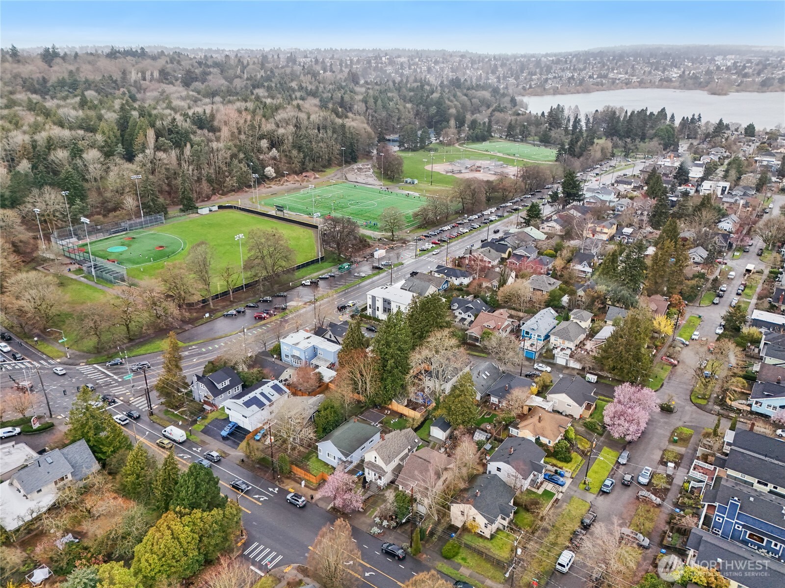 1420 North 50th Street Seattle, WA 98103 - Photo 28 of 30 an aerial view of residential houses with outdoor space and trees