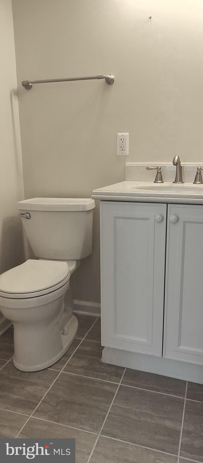 2019 Barclay Street Baltimore, MD 21218 - Photo 19 of 39 a bathroom with a toilet and a sink