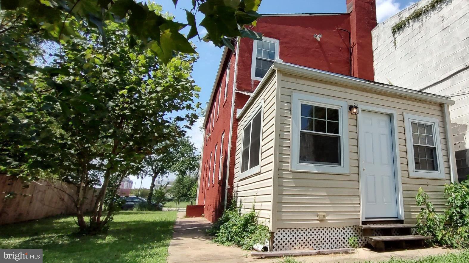 2019 Barclay Street Baltimore, MD 21218 - Photo 28 of 39 a view of a house with a yard