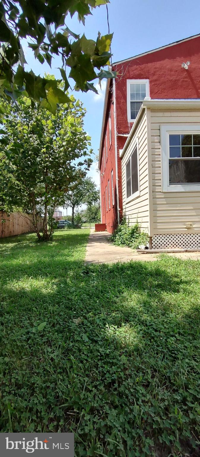 2019 Barclay Street Baltimore, MD 21218 - Photo 29 of 39 a backyard of a house with lots of green space