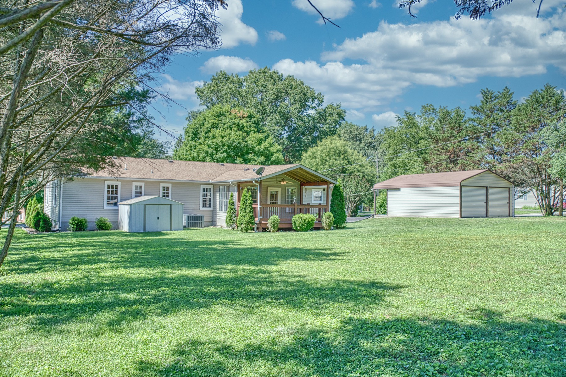 2085 Herbert Garrett Road Cookeville, TN 38506 - Photo 37 of 39 a front view of a house with a yard and trees