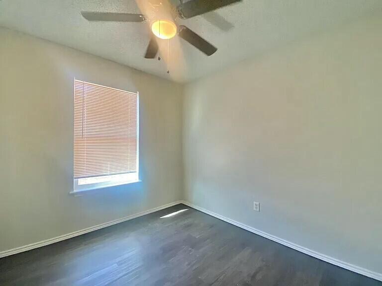 3 St Lubbock Tx 79415 Lubbock, TX 79415 - Photo 18 of 44 an empty room with a empty space and a window