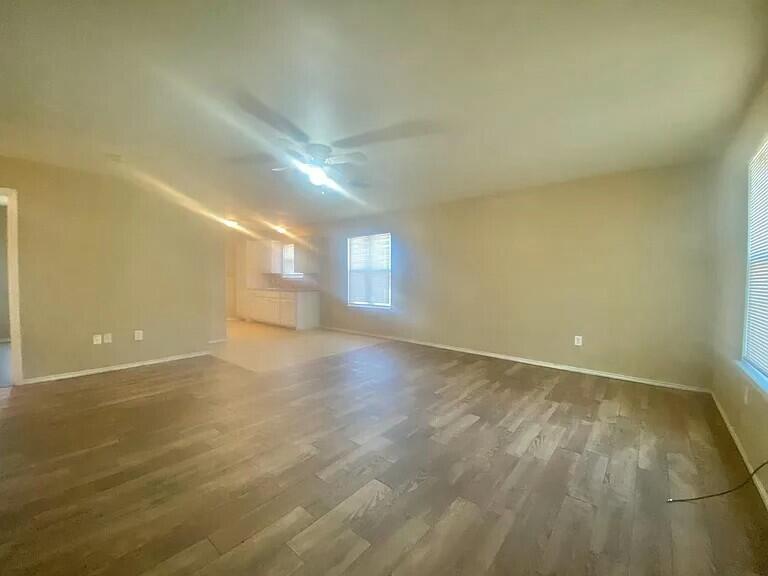 3 St Lubbock Tx 79415 Lubbock, TX 79415 - Photo 23 of 44 an empty room with a empty space and windows