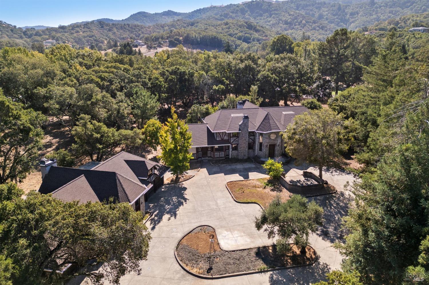 1975 Indian Valley Road Novato, CA 94947 - Photo 1 of 1 a view of a house with a yard and a garden