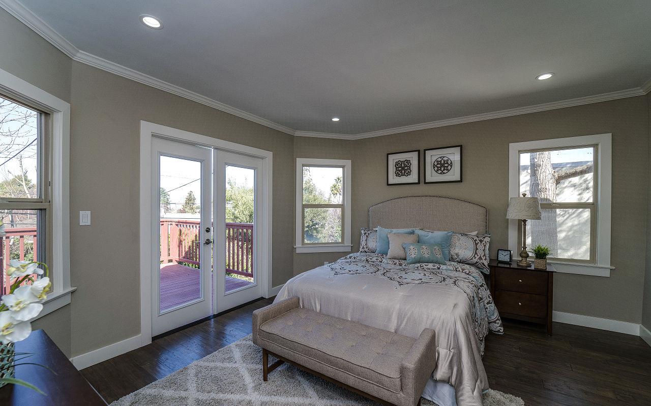 254 Hillcrest Boulevard Millbrae, CA 94030 - Photo 16 of 45 a bedroom with a large bed and a window