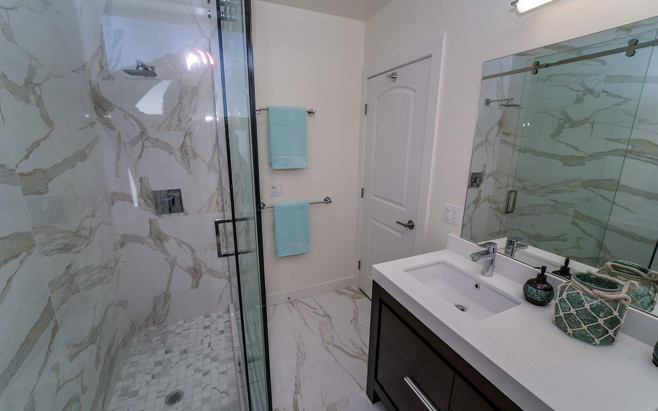 254 Hillcrest Boulevard Millbrae, CA 94030 - Photo 19 of 45 a bathroom with a sink and a mirror