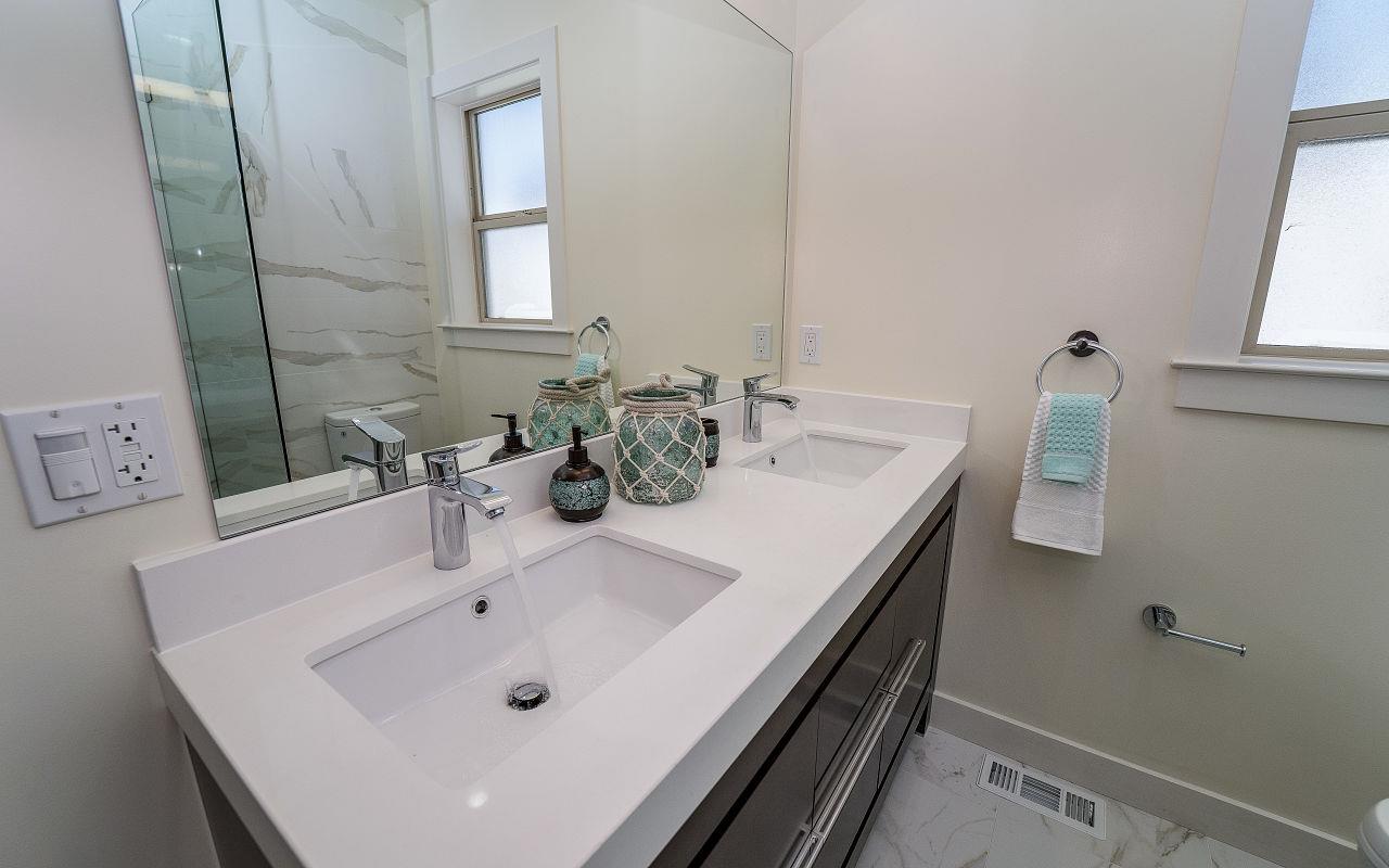 254 Hillcrest Boulevard Millbrae, CA 94030 - Photo 20 of 45 a bathroom with a sink and a mirror