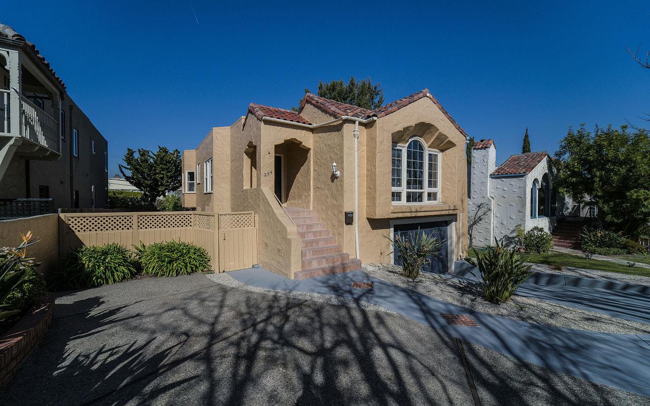 254 Hillcrest Boulevard Millbrae, CA 94030 - Photo 2 of 45 a front view of a house with a yard
