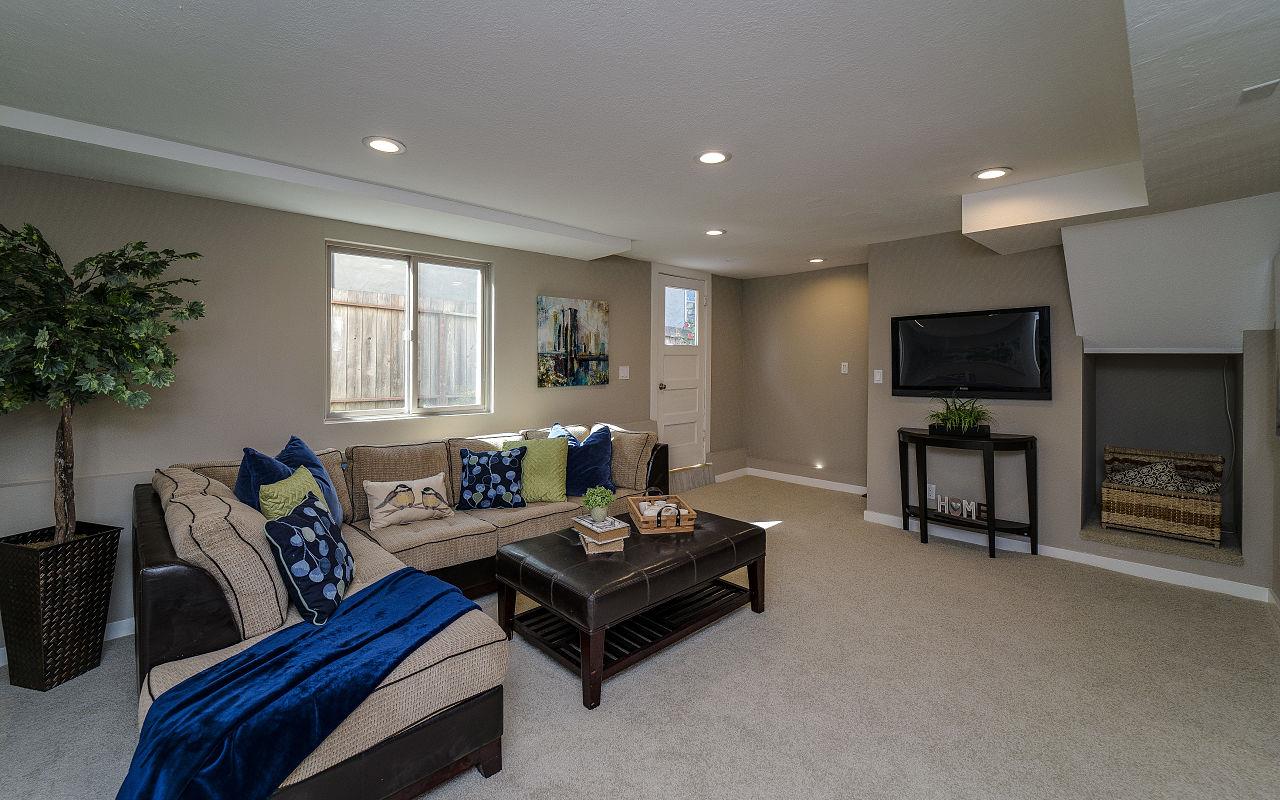 254 Hillcrest Boulevard Millbrae, CA 94030 - Photo 26 of 45 a living room with furniture and a flat screen tv
