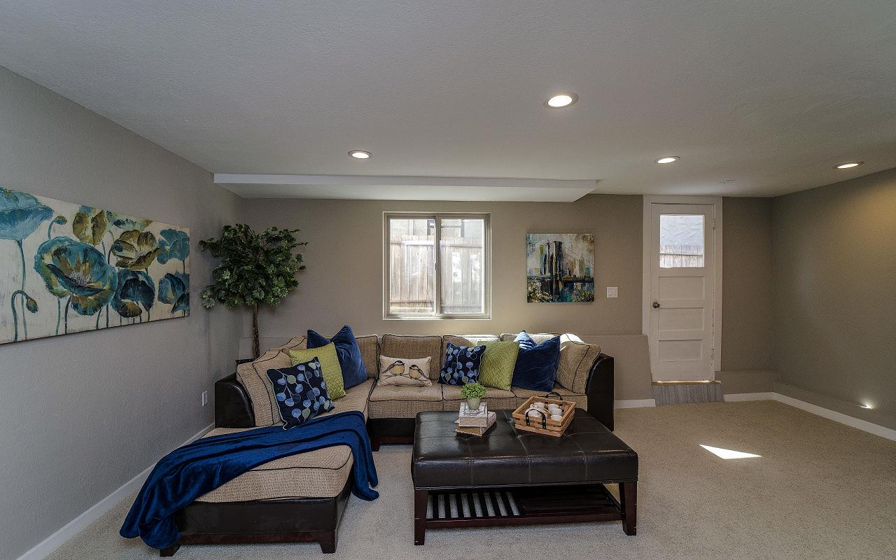 254 Hillcrest Boulevard Millbrae, CA 94030 - Photo 27 of 45 a living room with furniture and a potted plant