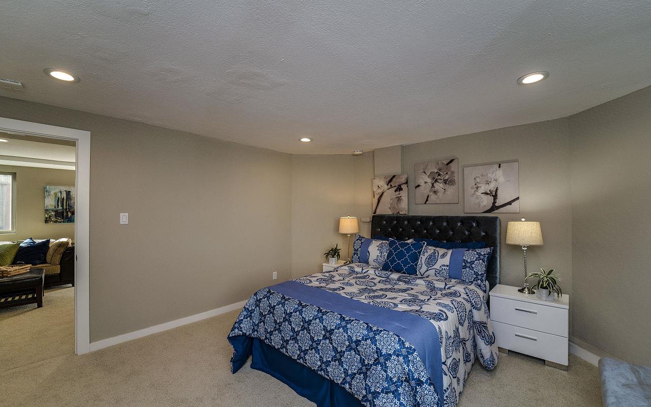 254 Hillcrest Boulevard Millbrae, CA 94030 - Photo 29 of 45 a bedroom with a bed and a lamp on dresser