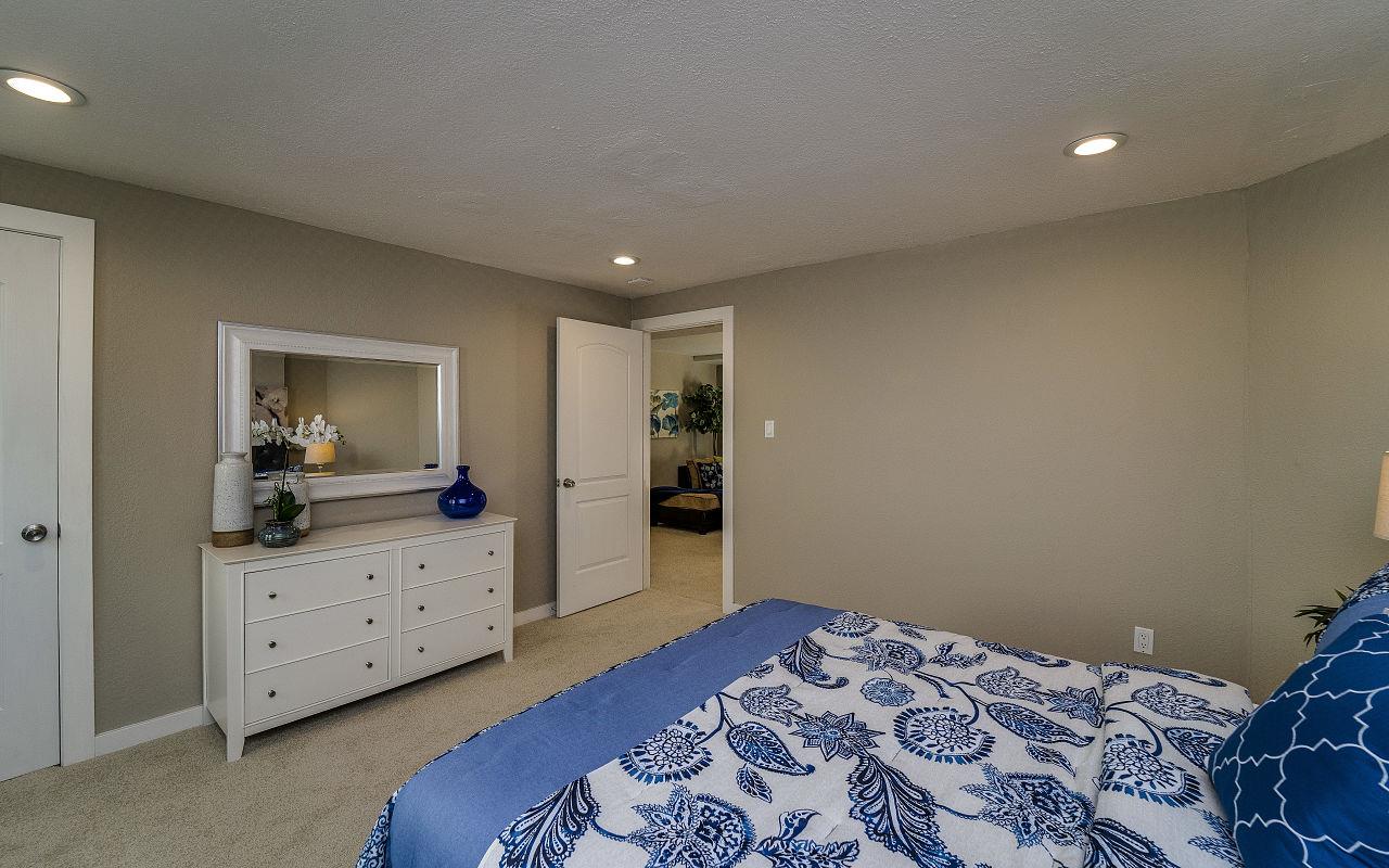 254 Hillcrest Boulevard Millbrae, CA 94030 - Photo 30 of 45 a bedroom with a bed and a dresser in it