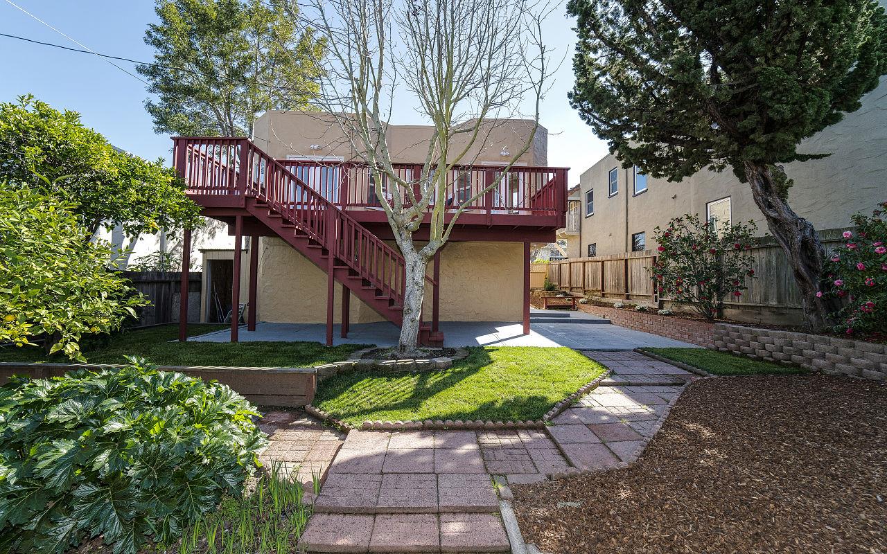 254 Hillcrest Boulevard Millbrae, CA 94030 - Photo 37 of 45 a view of a chair and table on the pathway