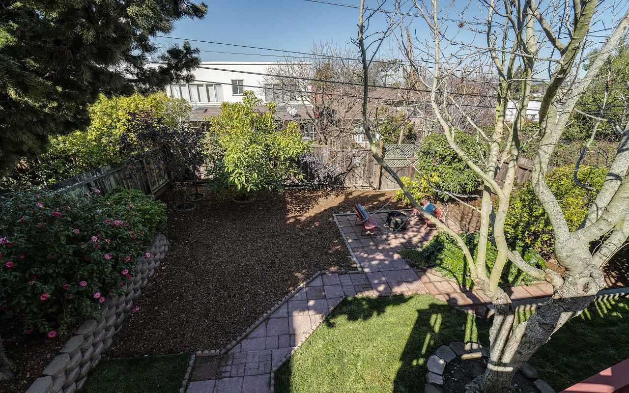 254 Hillcrest Boulevard Millbrae, CA 94030 - Photo 40 of 45 a backyard of a house with lots of green space