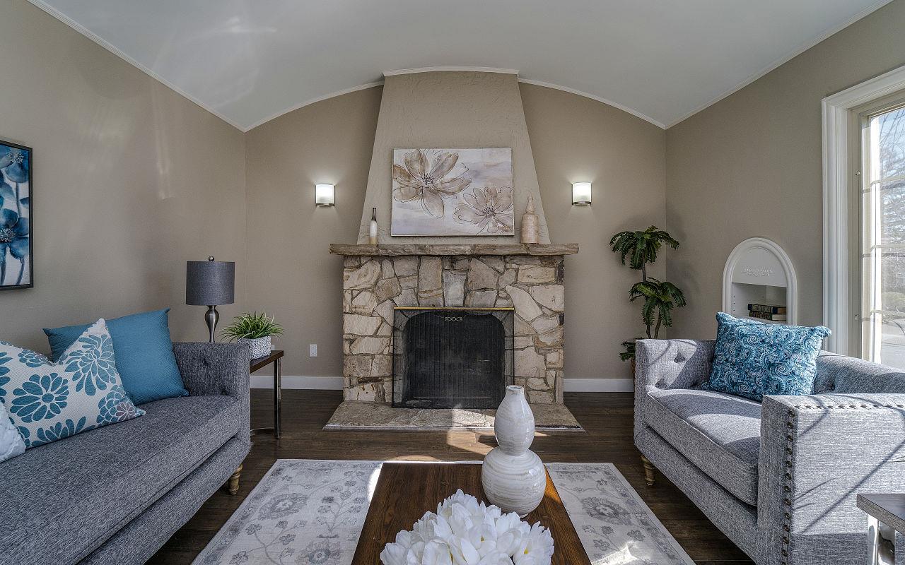 254 Hillcrest Boulevard Millbrae, CA 94030 - Photo 6 of 45 a living room with furniture and a fireplace