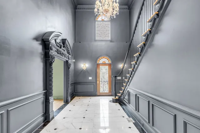 a kitchen with stainless steel appliances granite countertop a sink and cabinets