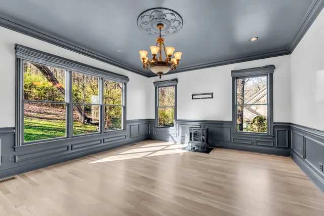 a bathroom with a shower and a sink