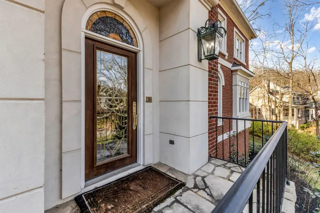a view of livingroom with fireplace and furniture