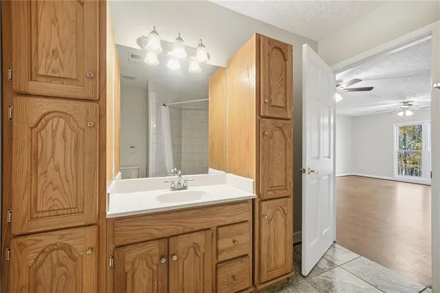 a bathroom with a bathtub and shower