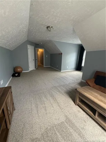 a view of a livingroom with furniture