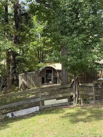 a view of a yard with an outdoor space