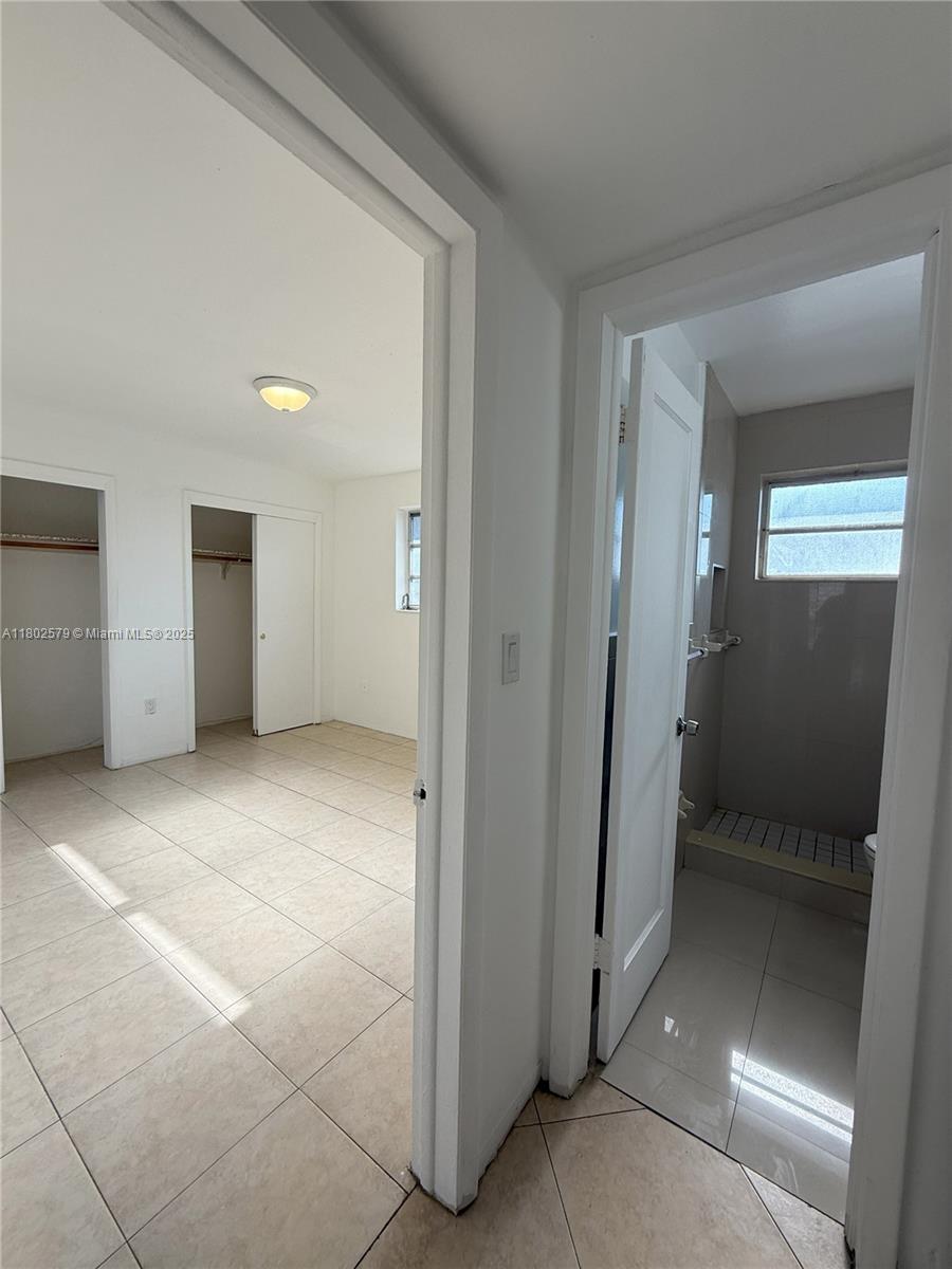 Flagami Miami, FL 33134 - Photo 7 of 10 an empty room with closet