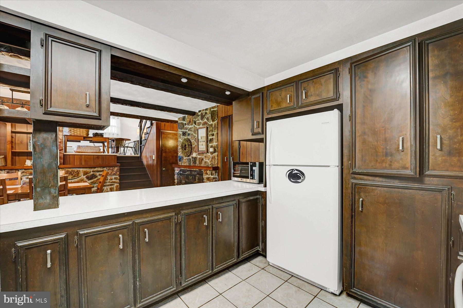 345 Spring Creek Road Bellefonte, PA 16823 - Photo 13 of 45 Charming kitchen with rustic appeal.