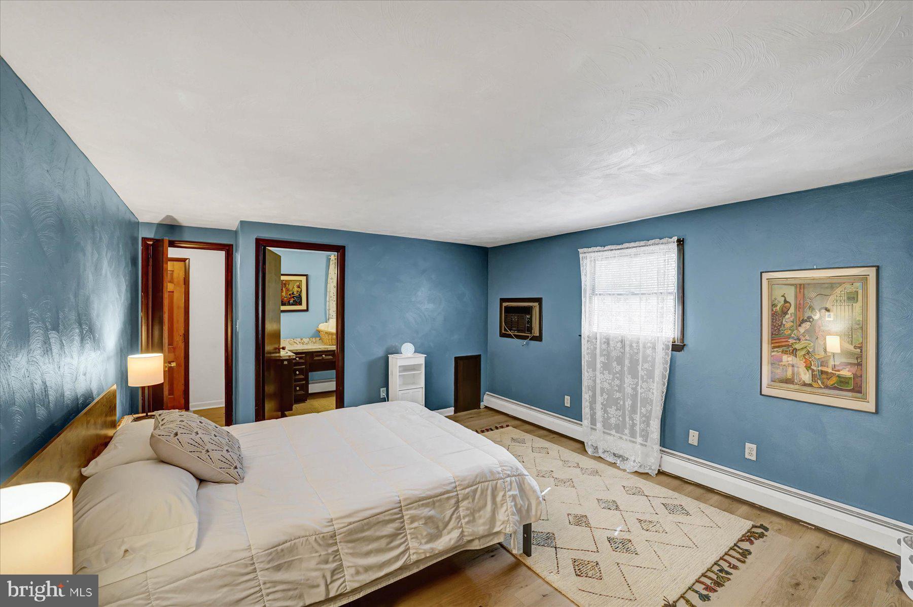 345 Spring Creek Road Bellefonte, PA 16823 - Photo 19 of 45 Serene blue-hued bedroom retreat.