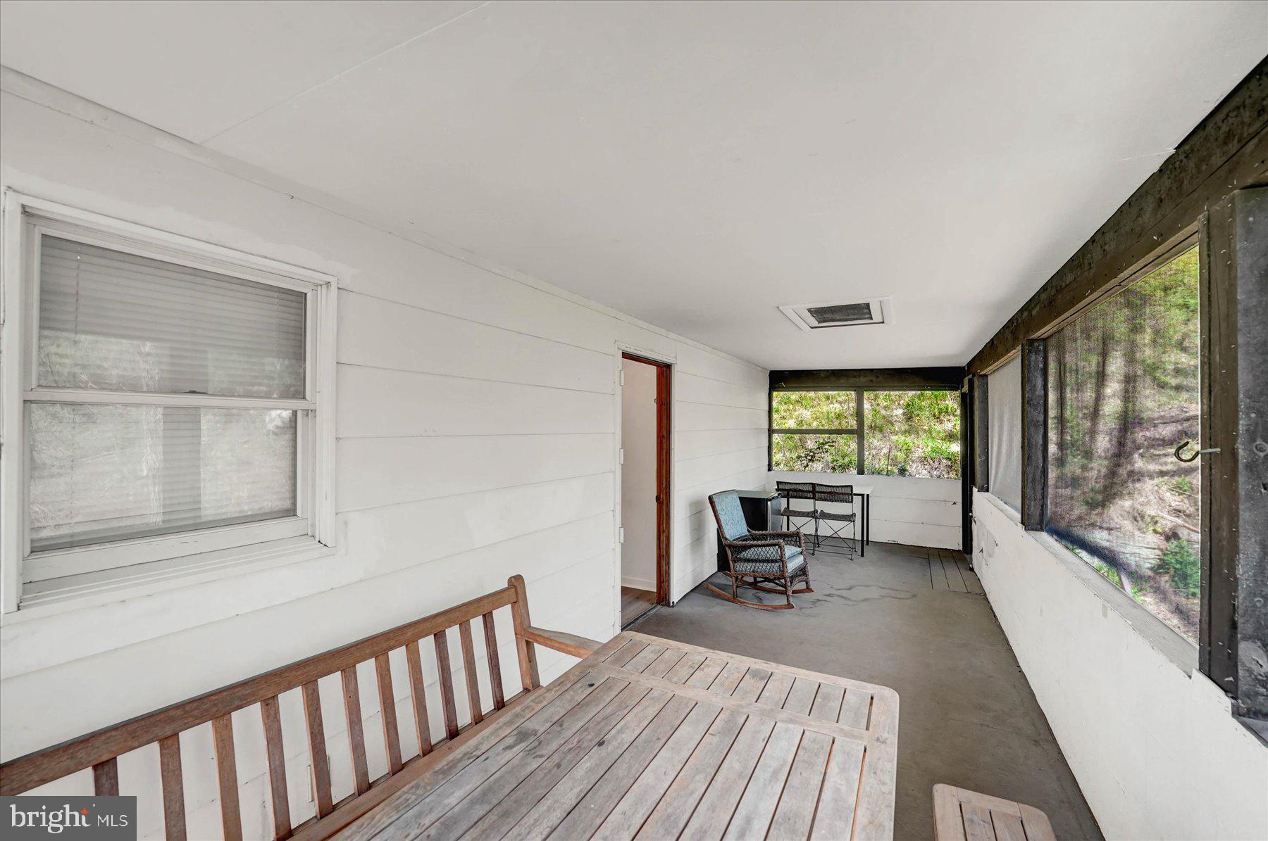 345 Spring Creek Road Bellefonte, PA 16823 - Photo 28 of 45 Serene screened porch retreat.