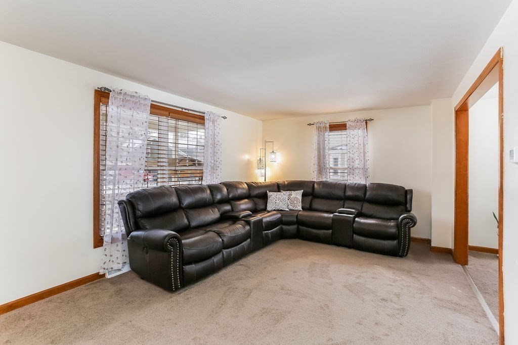 52 Eleanor Road Springfield, MA 01108 - Photo 4 of 34 a living room with furniture and a window