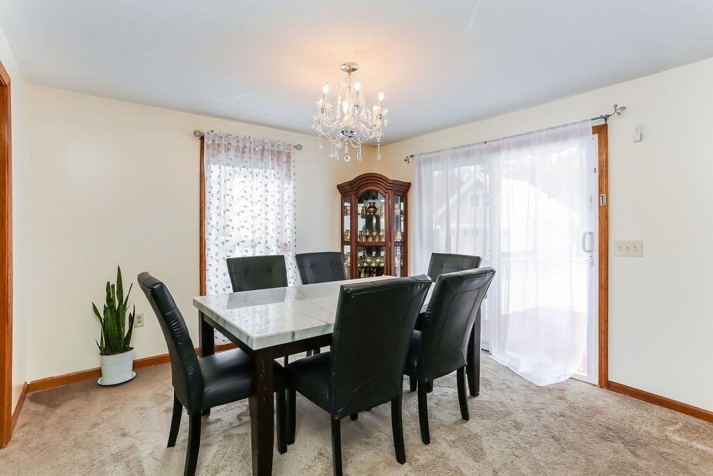 52 Eleanor Road Springfield, MA 01108 - Photo 6 of 34 a view of a dining room with furniture window and outside view