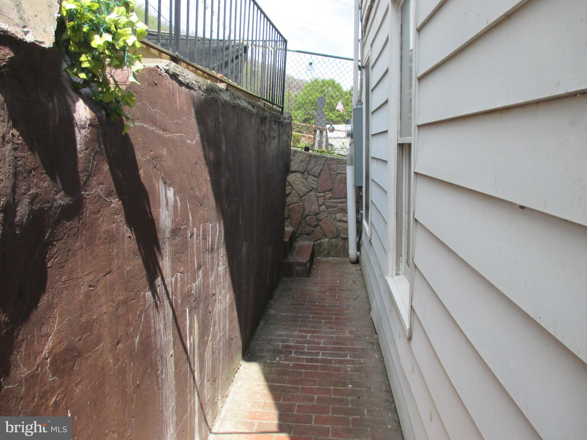 333 Pratt Street Luke, MD 21540 - Photo 37 of 42 a view of a pathway of a building