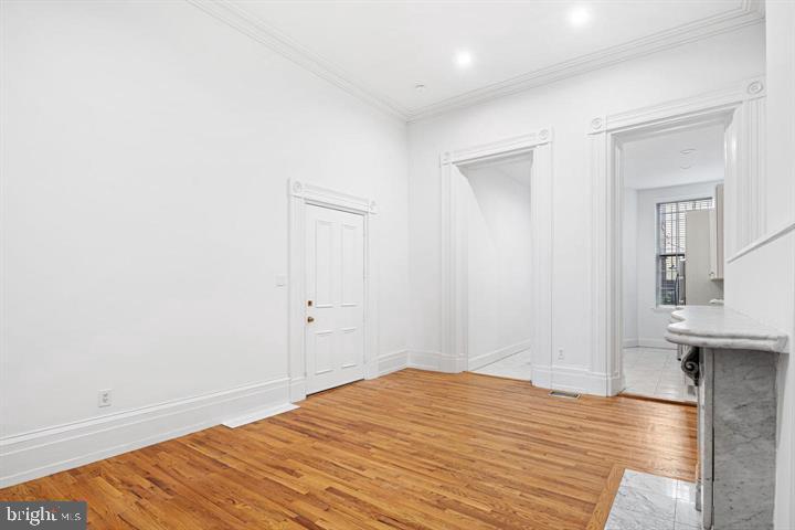306 South 10th Street, Unit A Philadelphia, PA 19107 - Photo 13 of 36 a room that has a bed and a view of bathroom