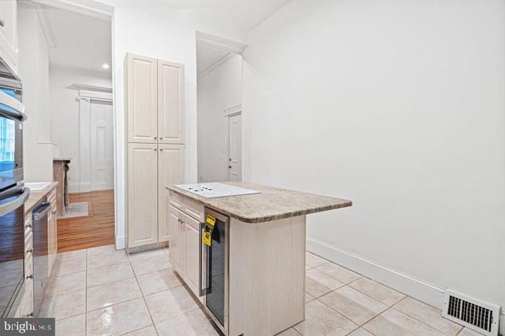 306 South 10th Street, Unit A Philadelphia, PA 19107 - Photo 16 of 36 a utility room with washer and dryer