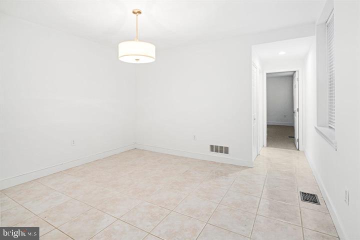 306 South 10th Street, Unit A Philadelphia, PA 19107 - Photo 18 of 36 a view of an empty room with a window