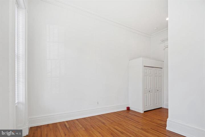 306 South 10th Street, Unit A Philadelphia, PA 19107 - Photo 20 of 36 a view of a room with wooden floor and white wall