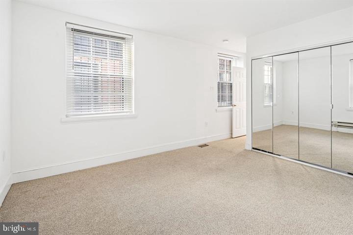 306 South 10th Street, Unit A Philadelphia, PA 19107 - Photo 25 of 36 an empty room with a empty shelves