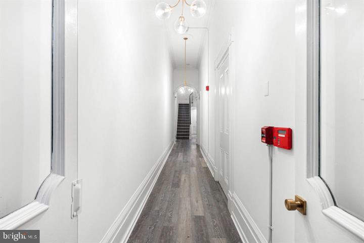 306 South 10th Street, Unit A Philadelphia, PA 19107 - Photo 28 of 36 a view of a hallway with wooden floor