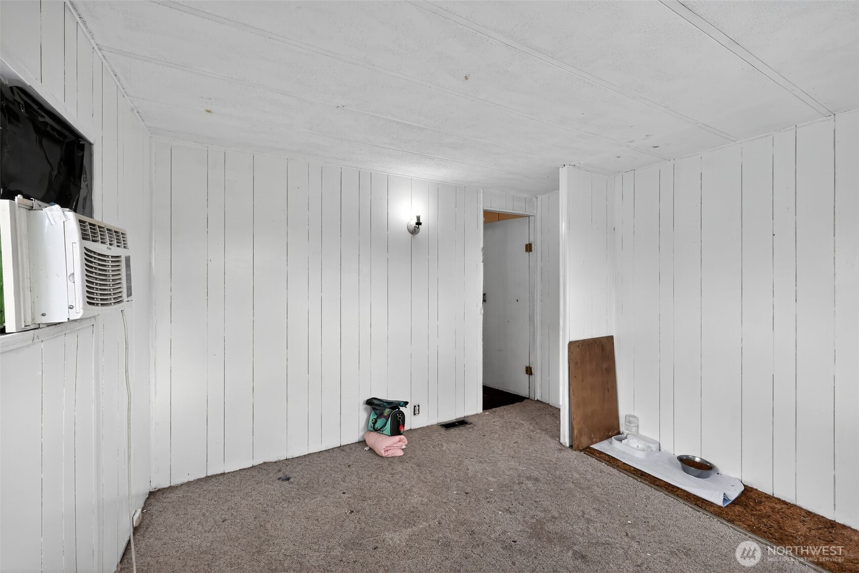 66 Fairgrounds Road, Unit 21 Elma, WA 98541 - Photo 12 of 31 a view of an empty room with a window