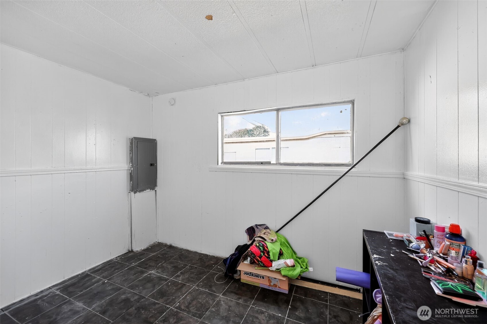 66 Fairgrounds Road, Unit 21 Elma, WA 98541 - Photo 29 of 31 a bedroom with furniture and a window