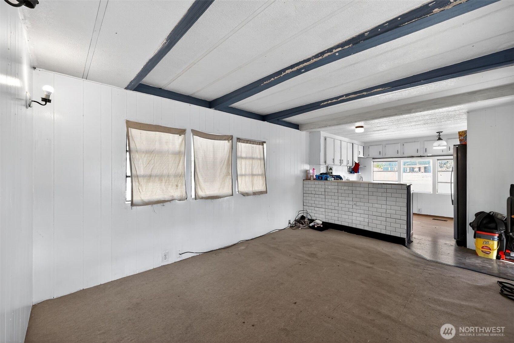 66 Fairgrounds Road, Unit 21 Elma, WA 98541 - Photo 5 of 31 a room with a bed and window