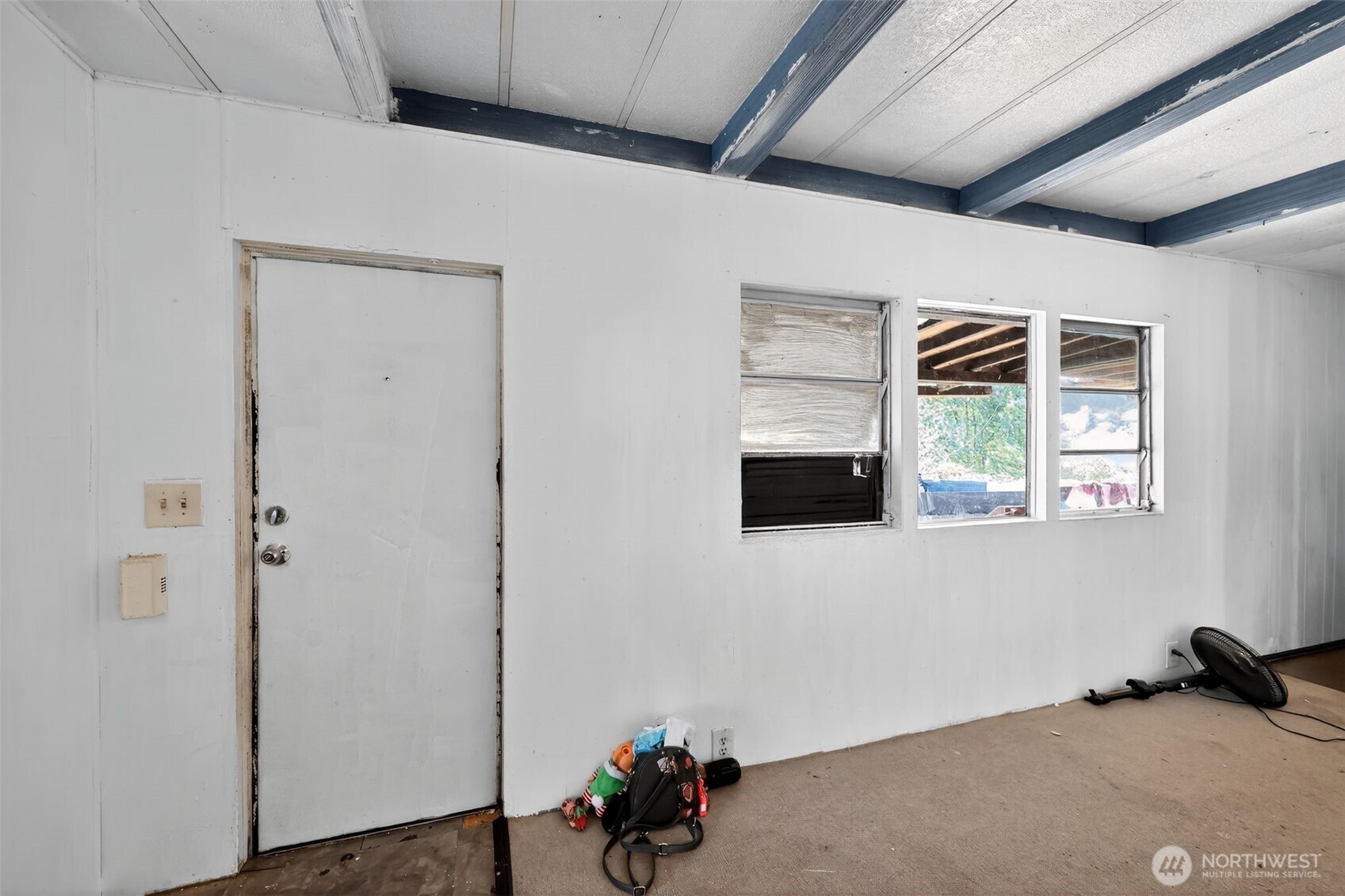 66 Fairgrounds Road, Unit 21 Elma, WA 98541 - Photo 10 of 31 a room with window and a ceiling fan