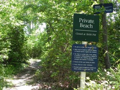 16 F R Lillie Road Woods Hole, MA 02543 - Photo 14 of 19 a sign that is sitting on a tree