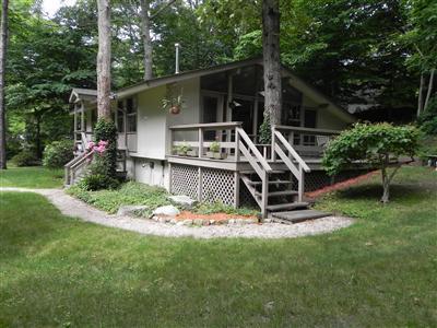 16 F R Lillie Road Woods Hole, MA 02543 - Photo 2 of 19 a view of a house with backyard and garden