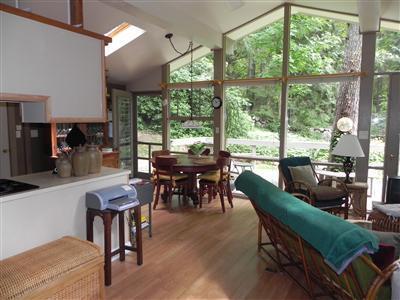 16 F R Lillie Road Woods Hole, MA 02543 - Photo 3 of 19 a view of a dining room with furniture window and outside view